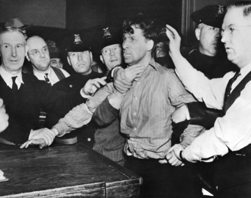 Percy Geary, a member of the Rubel heist gang, is seen here after his arrest on a previous kidnapping charge. He was named but never charged in the armored car robbery but went to Alcatraz for the kidnaping. The New York Times. Percy Geary, last of the three escaped members of the O'Connell kidnap gang, as he was brought into headquarters at Syracuse, N.Y., Nov. 18 after his capture. His capture followed that of his two cronies, John Oley and Harold Crowley, on Nov. 17. The trio escaped from Onondago County Prison two days ago. 11/18/1937 NYTCREDIT: Associated Press